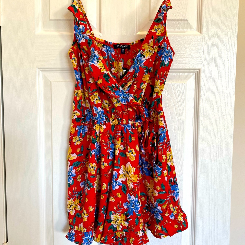 NWT Floral Romper with Ruffled Hem
